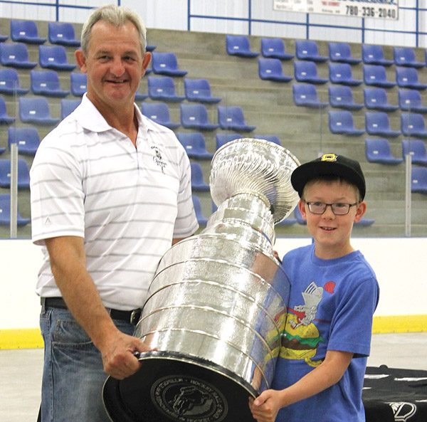 Darryl Sutter, head coach of the LA Kings and one of hockey’s famous Sutter brothers came back home to Viking this past Saturday with his second Stanley Cup. The event was not heavily advertised, with mostly local residents showing up for the opportunity of seeing the cup in person. He shared it with local residents at the Viking Carena, before taking it around the community and back to Sutter farm to celebrate privately.