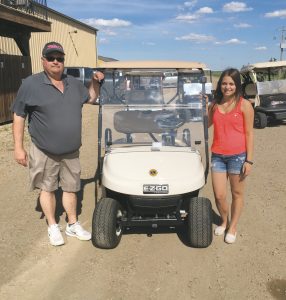 Lions golf cart donation