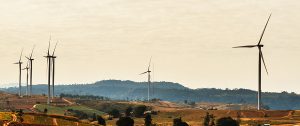 wind turbine on hill. concept clean energy in nature